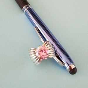 Sterling silver ring with pink stone